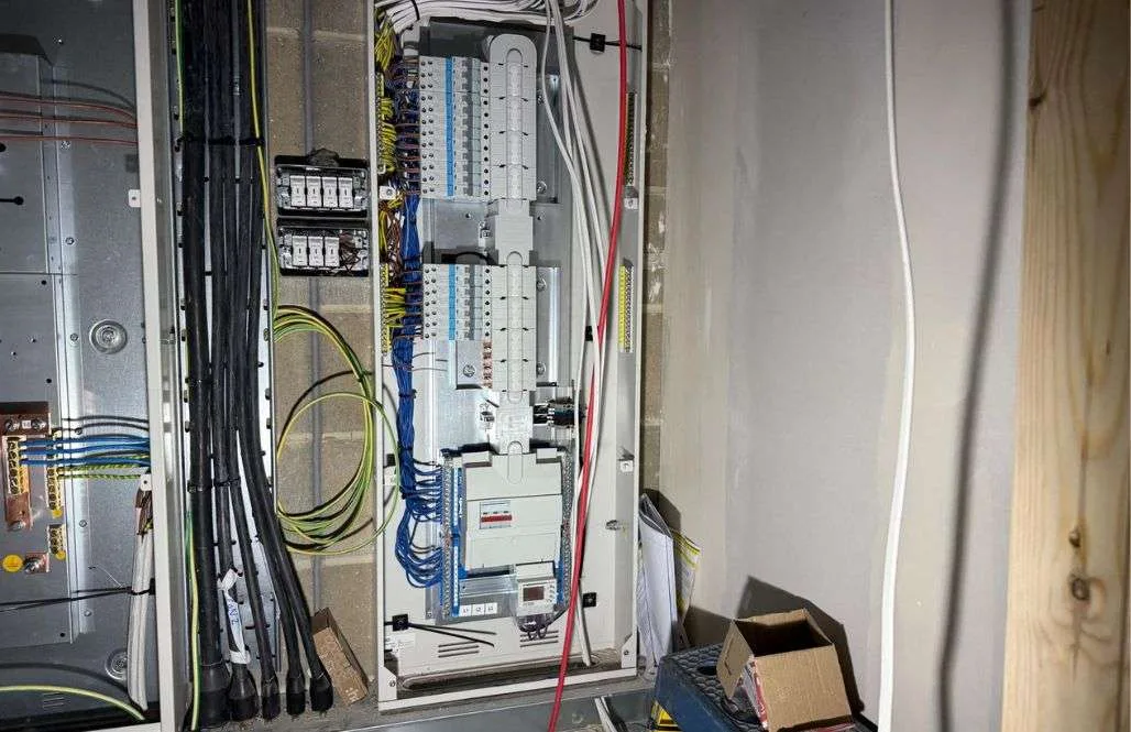 Commercial electrical distribution board during fit-out at newly developed residential block in Greenford