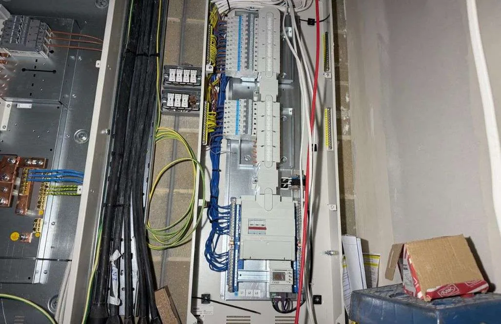 Commercial electrical distribution board during fit-out at newly developed residential block in Greenford